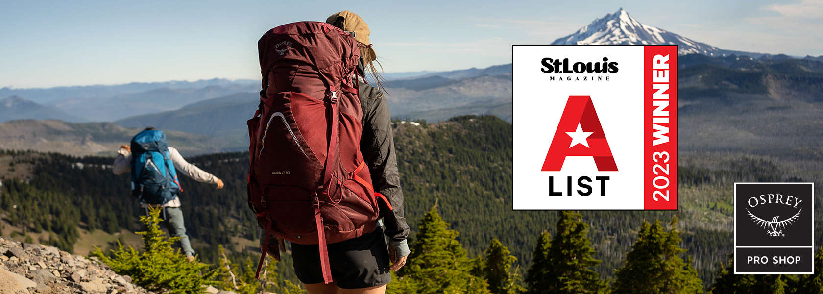 Woman backpacking with a mountain in the distance